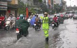 [ẢNH] Những kỹ năng lái xe an toàn khi trời mưa, ngập úng